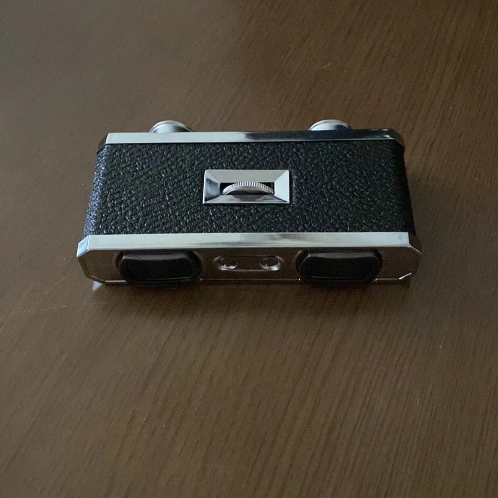 Antique binoculars in silver and black